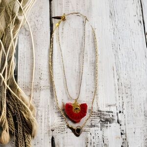 EUC gold toned tassel necklace